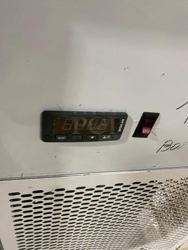 Custom Cool LB93SC 93" stainless steel 3-door refrigerated worktop table, like new, with built-in pan rack and digital controls.