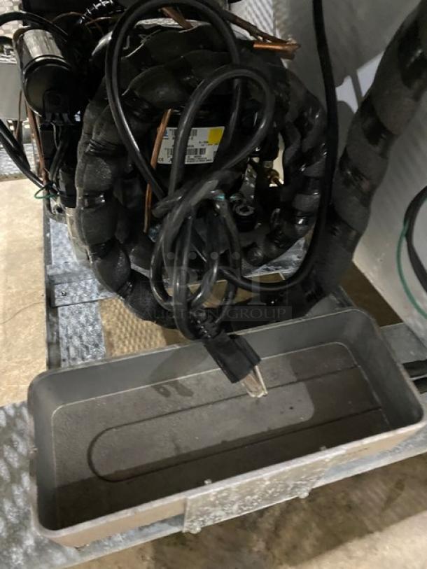 Custom Cool LB93SC stainless steel refrigerated worktop with pan rack, excellent condition. Features 3 doors, 115V, and casters.