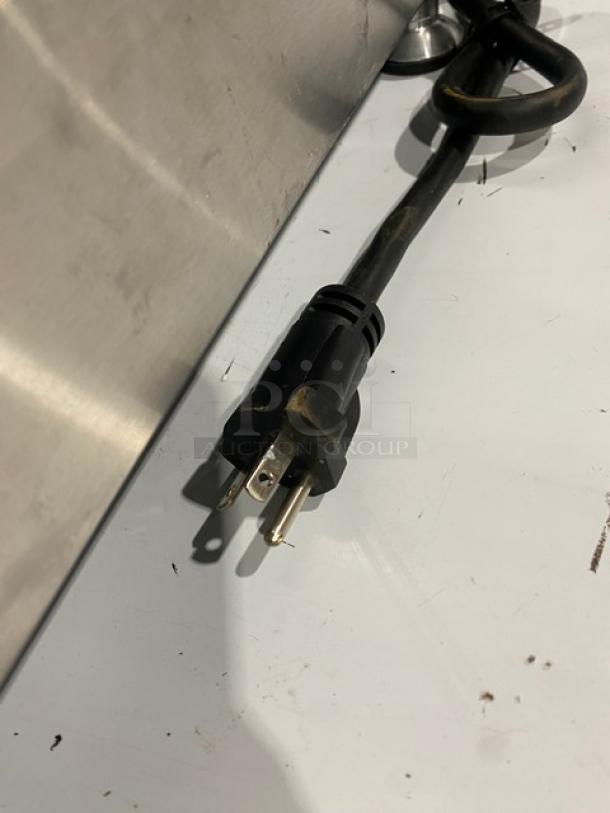 Omcan Model 41882 commercial pasta cooker plug and stainless steel side, features 240V power compatibility.