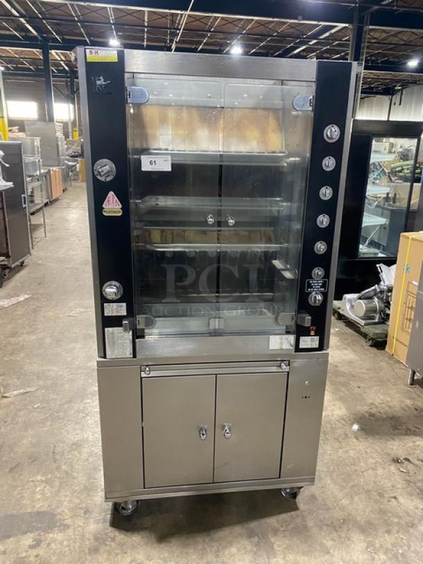 Rotisol stainless steel gas rotisserie oven, Model 9505, tempered glass doors, pull-out workstation, on casters, EUC.