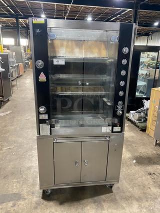 Rotisol stainless steel gas rotisserie oven, Model 9505, tempered glass doors, pull-out workstation, on casters, EUC.