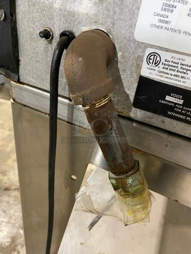 Cleveland Range BMR32 commercial rotisserie oven, stainless steel, natural gas, worn condition, label shows model & SN.