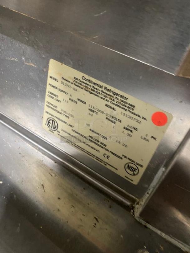 Continental DL2NISA commercial fridge data tag, model DL2NI-SA, SN 15130732, 115/208-230V, 1 phase, NSF certified.