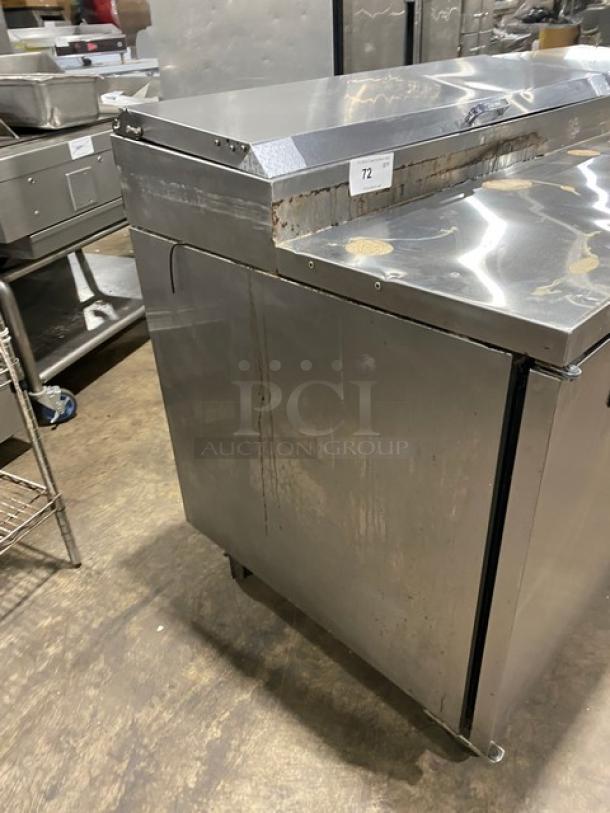True Commercial Stainless Steel 2-Door Pizza Prep Table, Model TPP67, on casters, slightly worn, 115V 1 Phase.