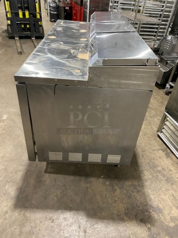 True TPP-67 commercial stainless steel 2-door pizza prep table on casters. Model TPP-67, SN 1-4237102, 115V 1 Phase. Used condition.