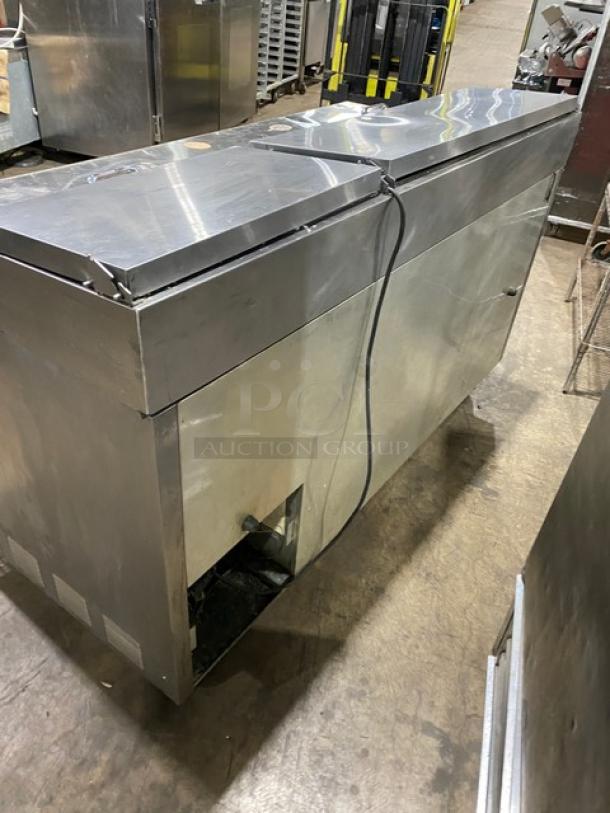 True TPP-67 stainless steel 2-door refrigerated pizza prep table on casters. Model: TPP67, SN: 1-4237102, 115V, 1 Phase.