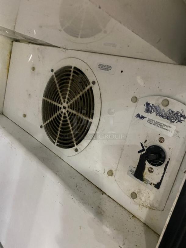 True Commercial TPP-67 pizza prep table showing internal fan and control panel. Used condition with visible wear.