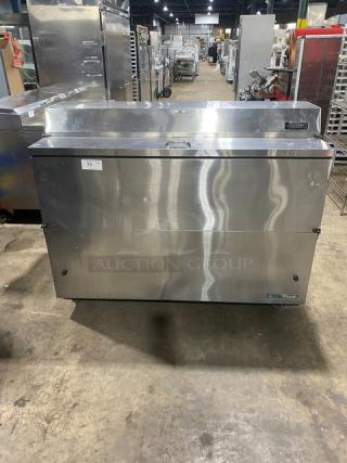True Commercial Stainless Steel Electric 2-Sided Milk Cooler, Model TMC-58-S-DS-SS-HC, with wired rack, good condition.