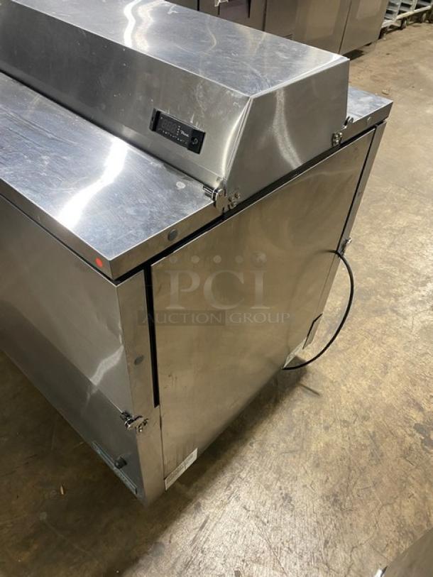 True Commercial Stainless Steel Electric 2-Sided Milk Cooler, Model TMC58SDSSSHC, with wired rack, in good condition.