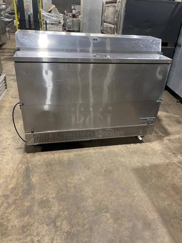 True TMC-58-S-DS-SS-HC stainless steel milk cooler, 2-sided, includes wired rack, electric, 115V, used condition.