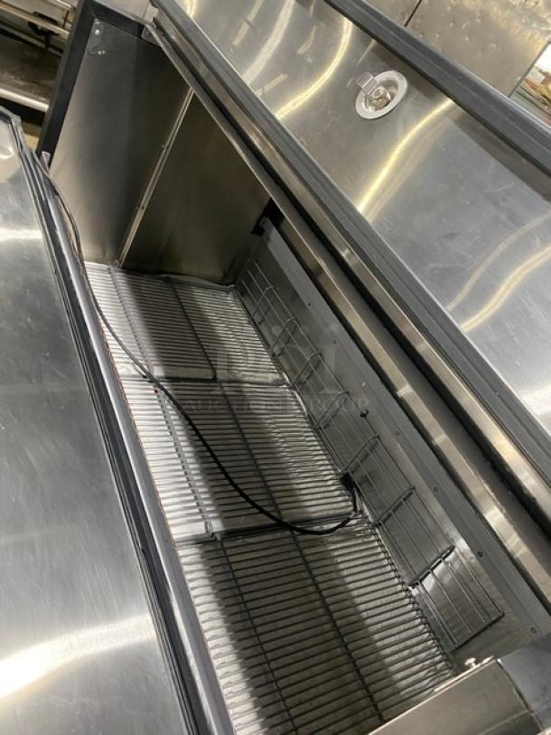 True commercial stainless steel milk cooler, model TMC58SDSSSHC, with wired rack, 2-sided, 115V.