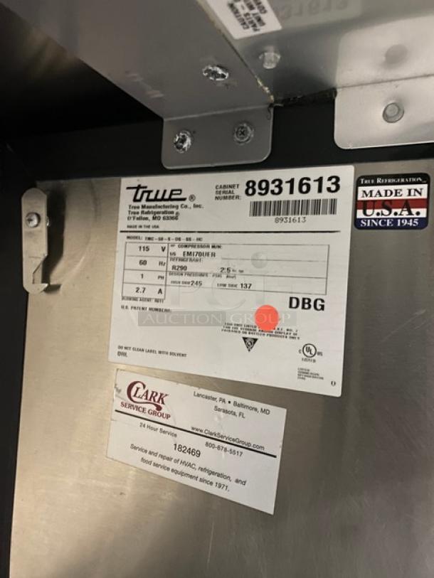 True TMC58SDSSSHC commercial milk cooler, stainless steel, electric, with wired rack, SN: 8931613, 115V 1 Phase.