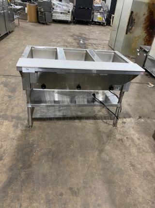 Advance Tabco stainless steel 3-pan hot food well, model SW-3E-240-SUP, with undershelf and cutting board, 208/240V 1 Phase.