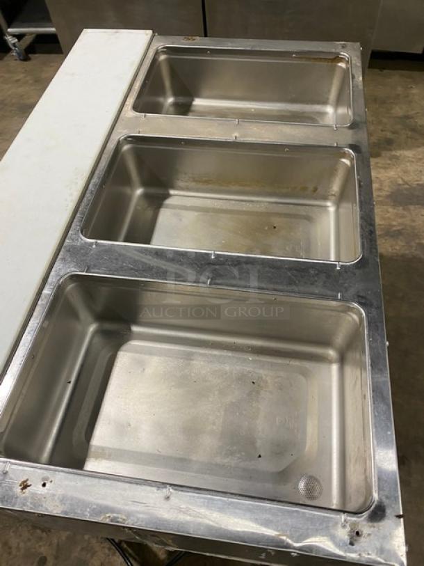 Advance Tabco SW-3E-240-SUP 3-pan stainless steel hot food well with single undershelf and cutting board, used condition.