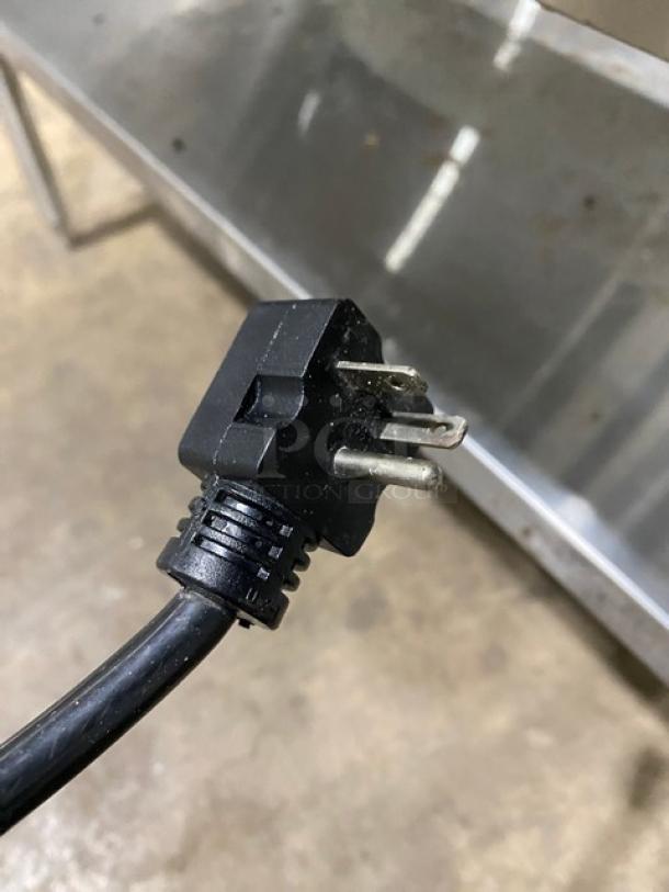 Close-up of power plug for Advance Tabco Model SW3E240SUP commercial hot food well, showing electrical prongs condition.