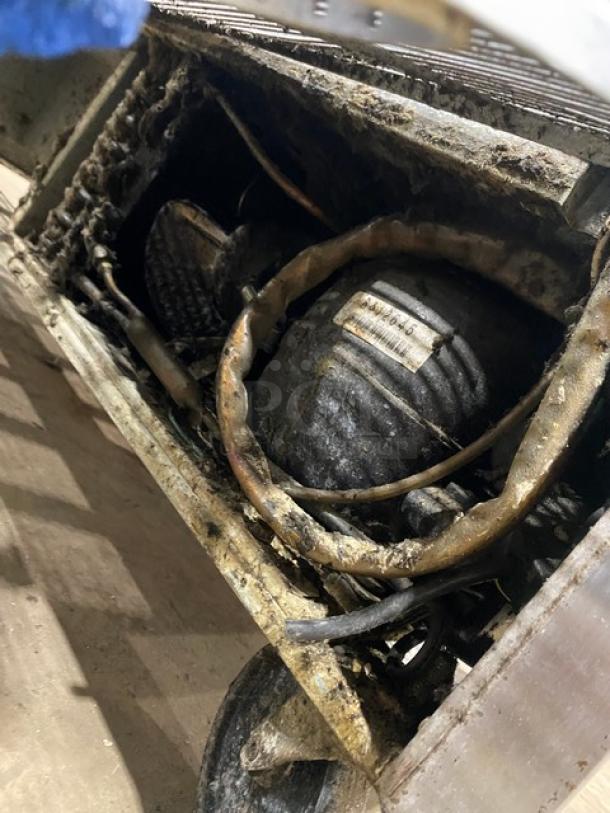 Beverage Air commercial stainless steel 2-door cooler, refrigerated worktop model with poly-coated wire rack, on casters.