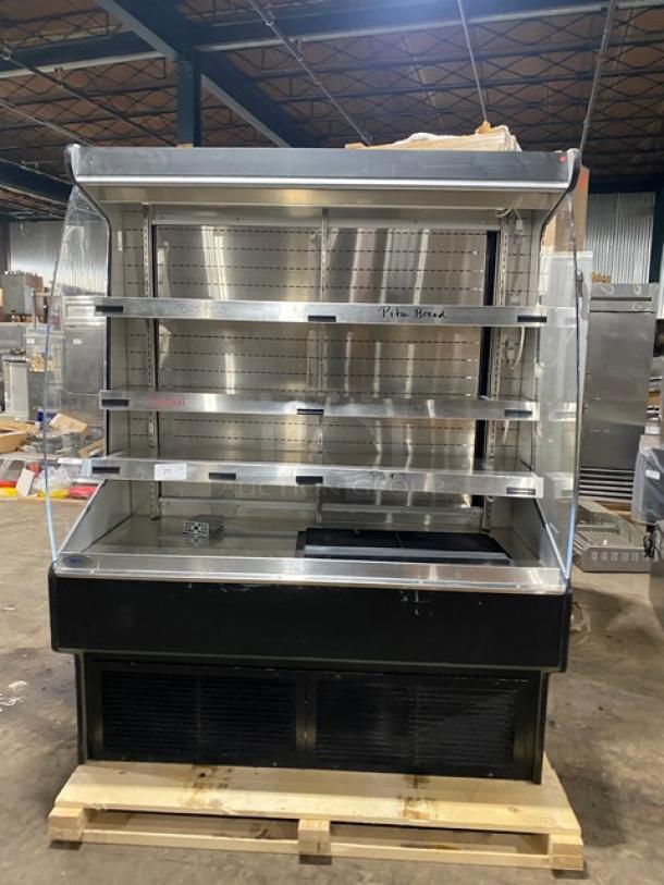 Commercial refrigerated open air multi-tier merchandiser display case with rear access sliding doors, stainless steel, used condition.