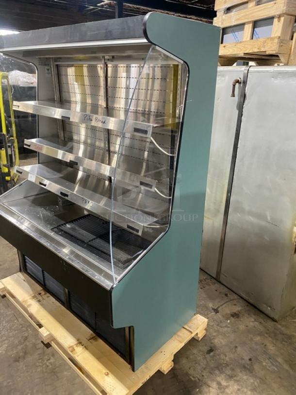 Commercial refrigerated multi-tier grab-n-go merchandiser display case with sliding rear doors, stainless steel shelves.