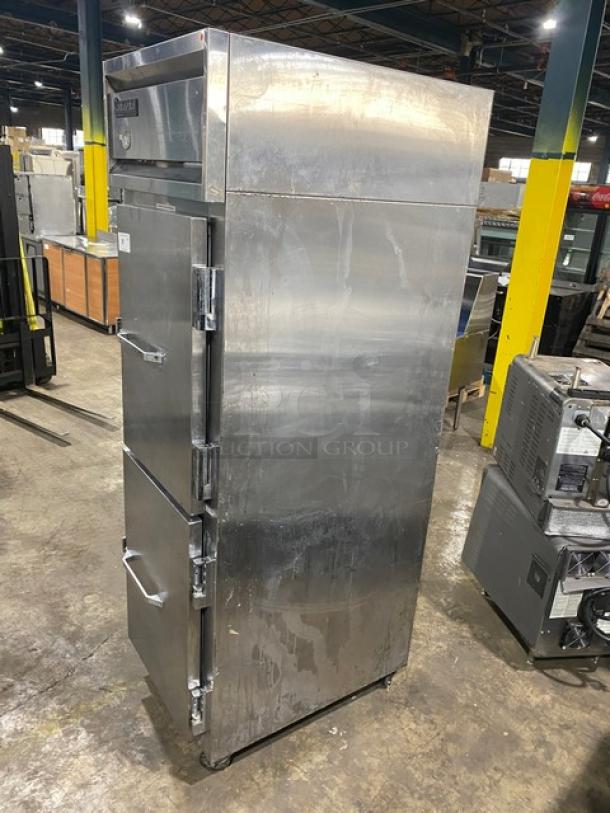 Continental 1R-SS-HD commercial stainless steel half door refrigerator, model 1RSSHD, on casters, used condition.