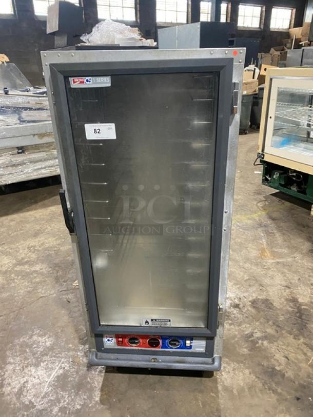 Metro C5-1 Series C517-CFG-4 heated cabinet, glass door, digital controls, built-in pan slide, on casters, 120V, SN: 382536.