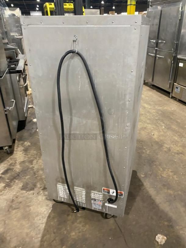 Metro C5-1 Series Single Glass Door Heated Cabinet, Model C517CFG4, with digital controls, universal pan slide, on casters, 120V.