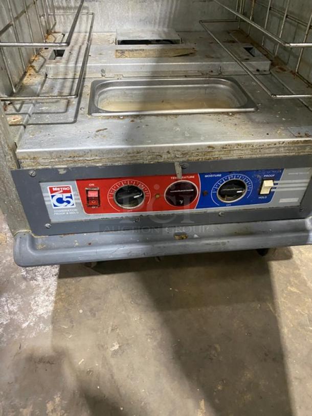 Metro C5-1 Series heated cabinet, model C517-CFG-4, digital controls, universal pan slide, on casters, 120V, used condition.