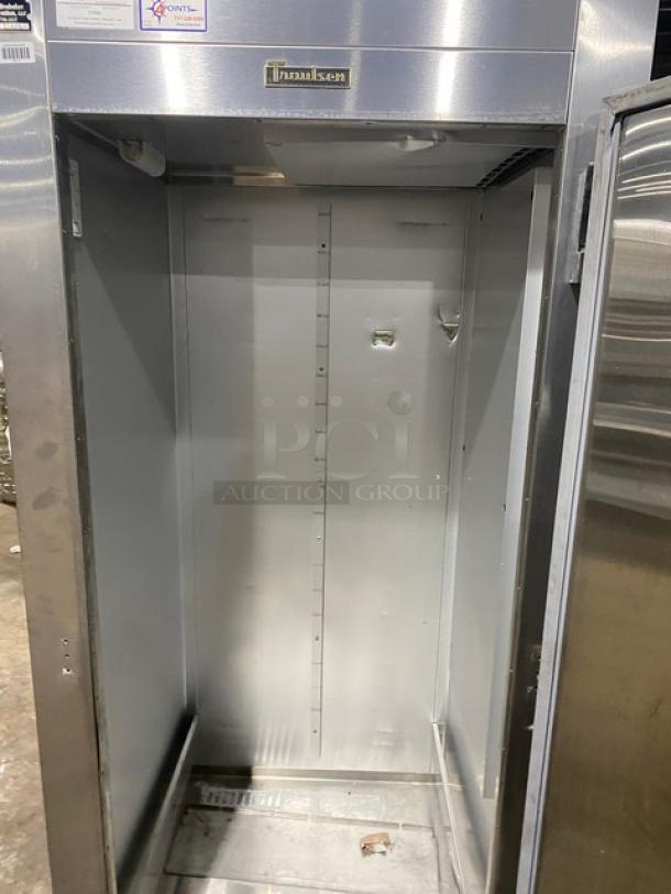 Traulsen stainless steel one-door reach-in refrigerator, model ARI132LUT-FHS. Digital controls, on casters, open door view.