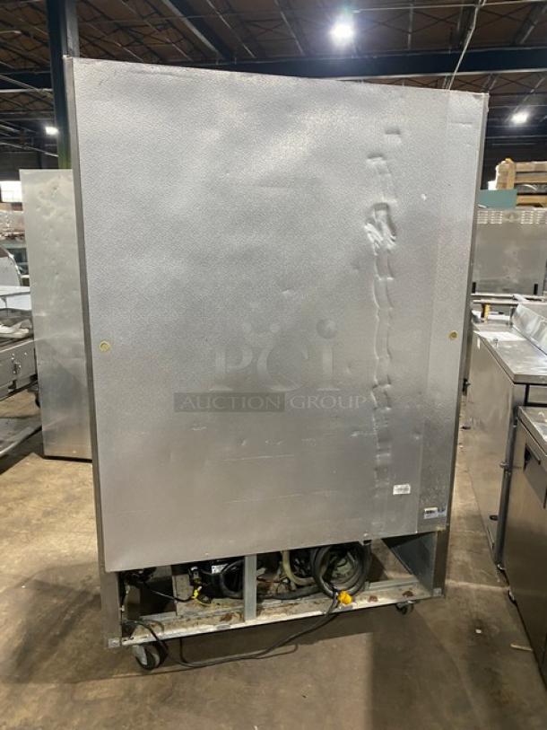 Avantco Commercial Stainless Steel 2-Door Reach-In Refrigerator, Model CFD-2RR, on casters, showing rear view.