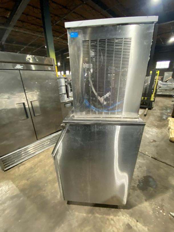 Manitowoc RNF0620W stainless steel ice machine/bin combo, air-cooled, 115V, on legs, commercial-grade, excellent condition.