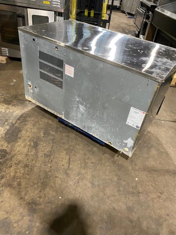 Hoshizaki commercial ice machine, stainless steel, water-cooled, model KM-1601SWH3. Electric powered, 208-230V, 3 phase. Signs of wear.