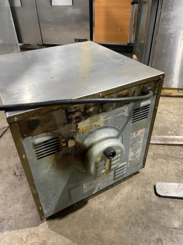 MerryChef commercial stainless steel countertop high-speed rapid cook oven, electric-powered, with wired rack, signs of wear.