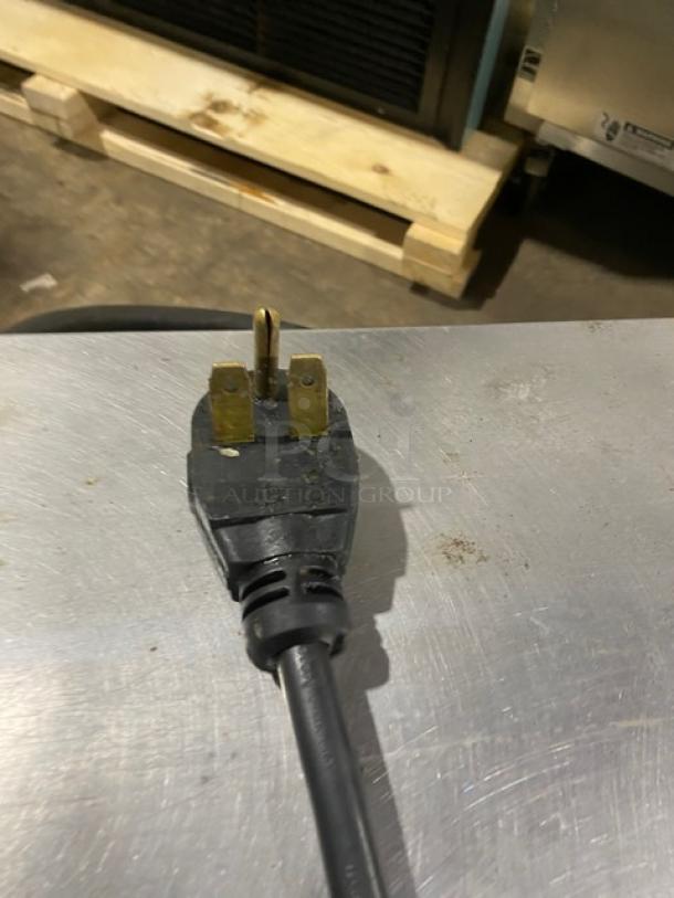 MerryChef commercial stainless steel high-speed turbo oven power plug, showcasing electric compatibility, in good condition.