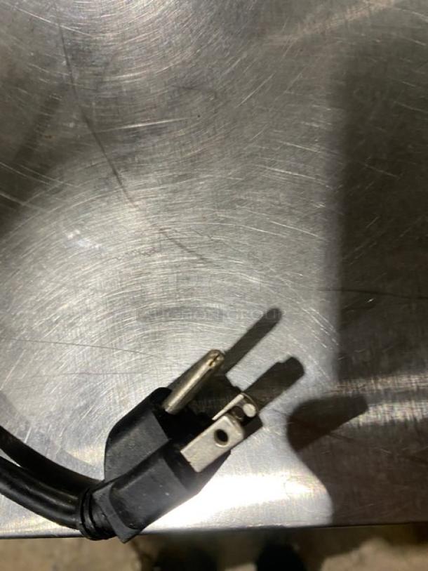 Alt text: Southbend commercial natural gas convection oven power plug on metal surface.