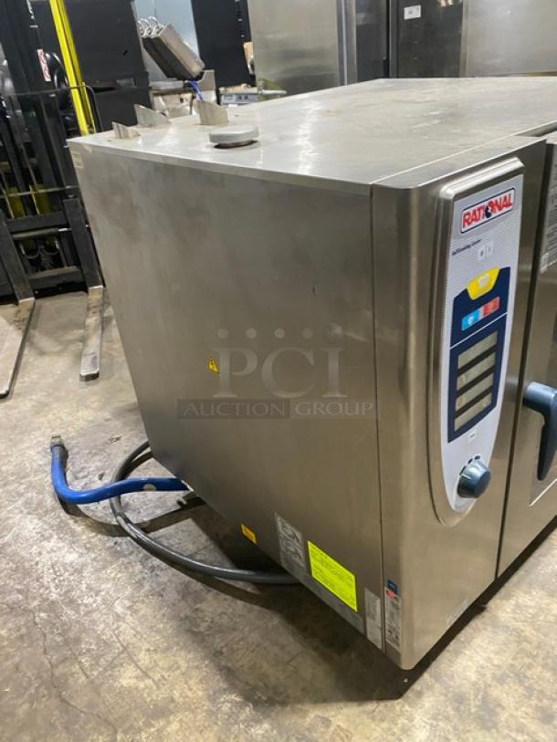 Rational SCC102G SelfCooking Center Combi Oven, electric powered, stainless steel, with wired oven rack, on legs.