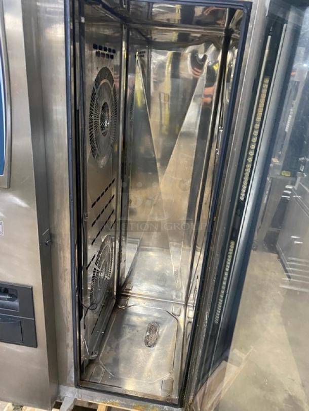 Rational SelfCooking Center full-size combi oven, model SCCWE201G. Stainless steel, electric, on legs. Interior view, fan visible.
