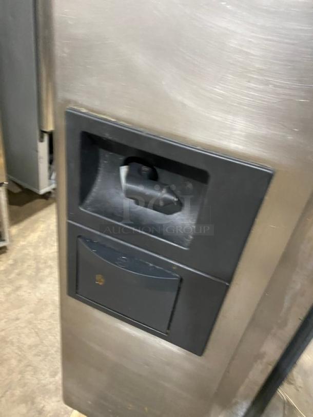 Rational SelfCooking Center SCCWE201G combi oven in stainless steel, on legs. Features control panel. Good condition.