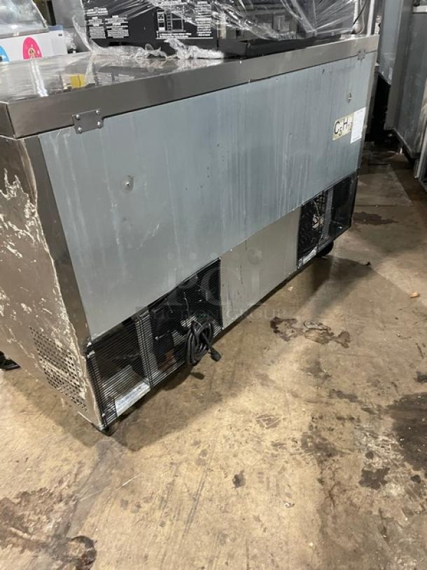 Migali C-U60R-HC stainless steel 2-door undercounter lowboy refrigerator on casters, features poly-coated wired rack, used condition.