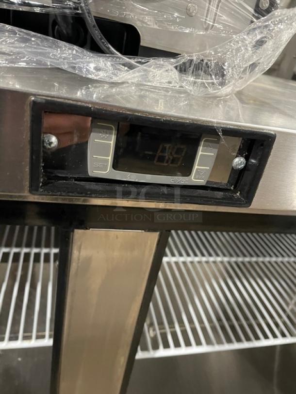 Migali CU60RHC commercial stainless steel 2-door undercounter refrigerator, digital display, poly coated wire rack, on casters.