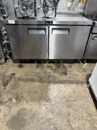 Migali CU60RHC stainless steel 2-door undercounter refrigerator on casters, with poly-coated wired rack, 115V 1 phase.