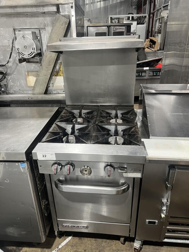 Southbend S241E stainless steel range/oven combo, 4-burner, natural gas, with backsplash, salamander shelf, wired rack, on casters.