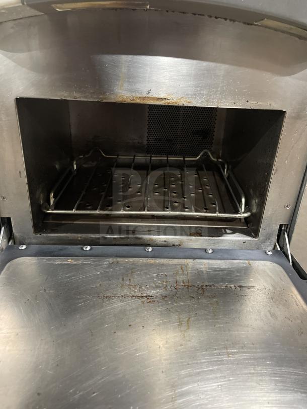 TurboChef Commercial Rapid Cook Oven, Model NGO. Stainless steel interior, digital controls. Used condition, 208/240V, 1 phase.