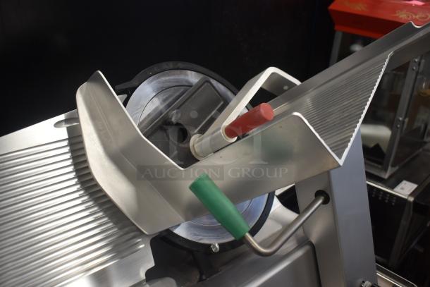 2023 Bizerba GSP H Commercial Meat Slicer with blade sharpener. Mounted on Face to Face equipment stand, 120V, 1 Phase.