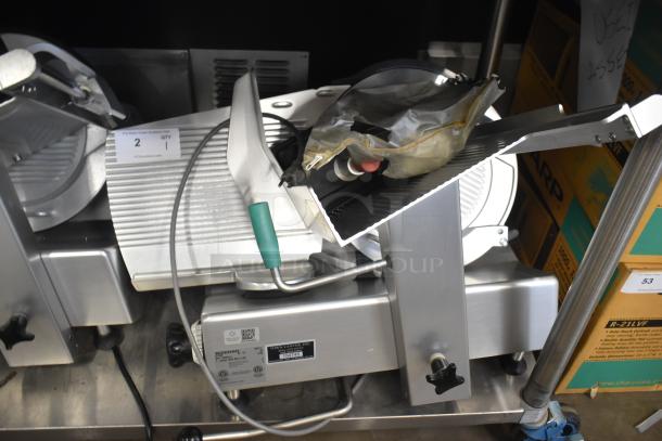 2019 Bizerba GSP H Commercial Meat Slicer with blade sharpener, 120V, 1 Phase. Features clean stainless steel finish.