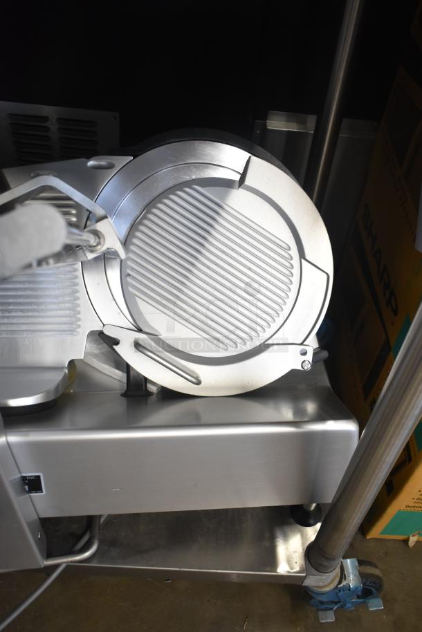 2019 Bizerba GSP H commercial meat slicer with blade sharpener, 120 volts, 1 phase, in excellent condition.