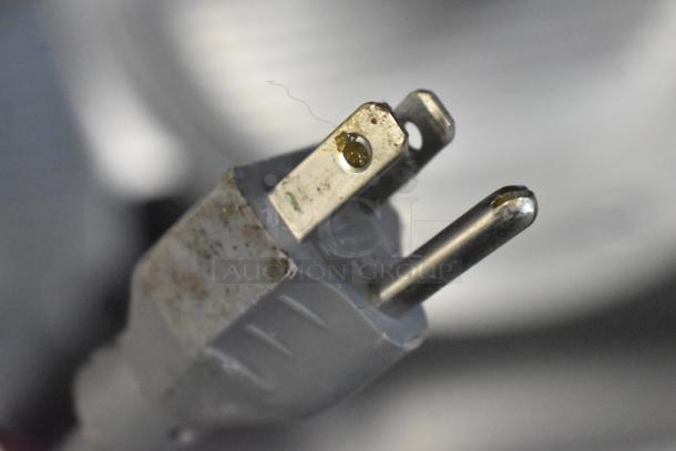 The image shows a close-up of a power plug from a 2019 Bizerba GSP H Commercial Meat Slicer, highlighting the plug's condition.
