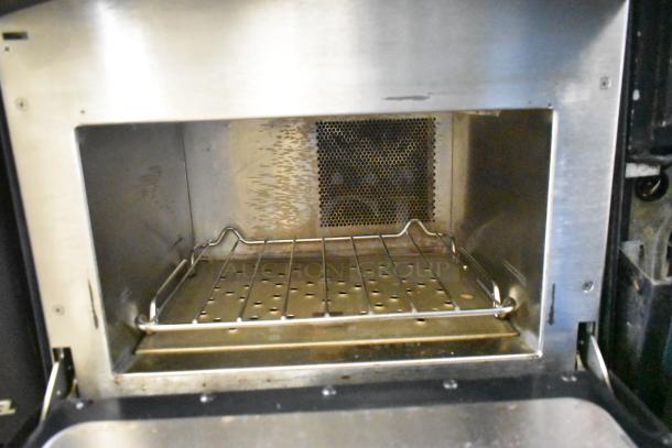 2022 Turbochef NGO rapid cook oven interior. Stainless steel, electric, countertop model. Visible grill rack.
