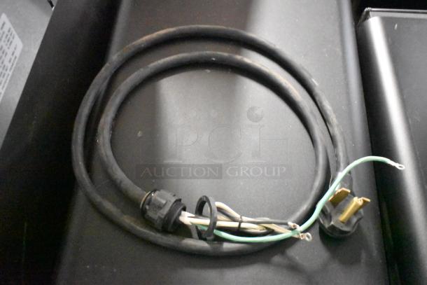 2022 Turbochef NGO rapid cook oven, electric, 208/240V, 1 phase, countertop commercial model. Visible cord and plug.