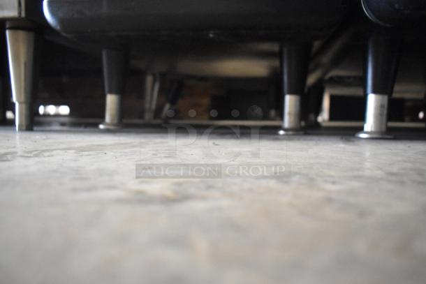 2022 Turbochef NGO countertop electric rapid cook oven, model NGO, 208/240V, 1 phase, shown with adjustable feet.