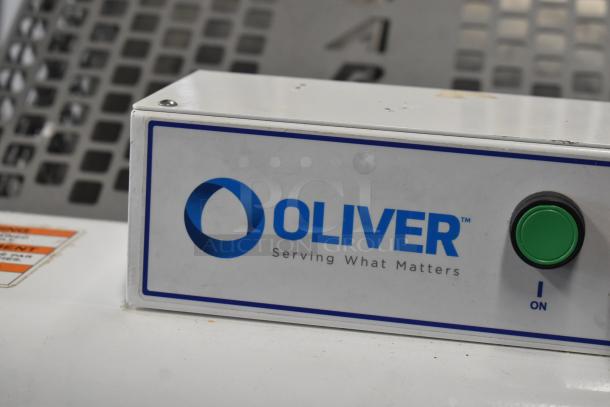 Oliver 797-32NC Commercial Bread Loaf Slicer with Pro Guard Safety Chute, featuring control panel and branding, 115 volts.