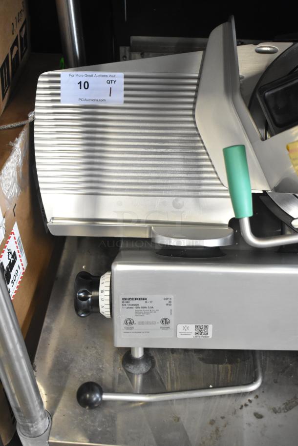 2017 Bizerba GSP H meat slicer, commercial model, 120 volts, cut power cord; labels show model and voltage details.